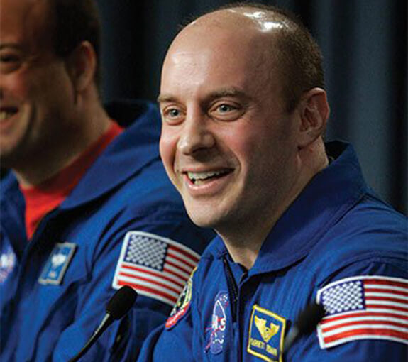 ASTRONOT GARRETT REISMAN