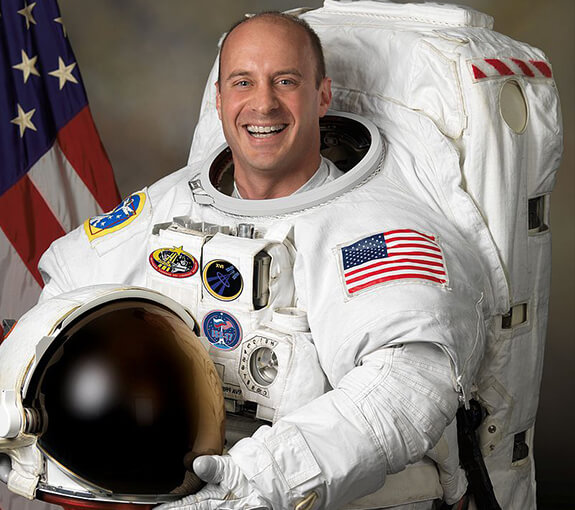 ASTRONOT GARRETT REISMAN